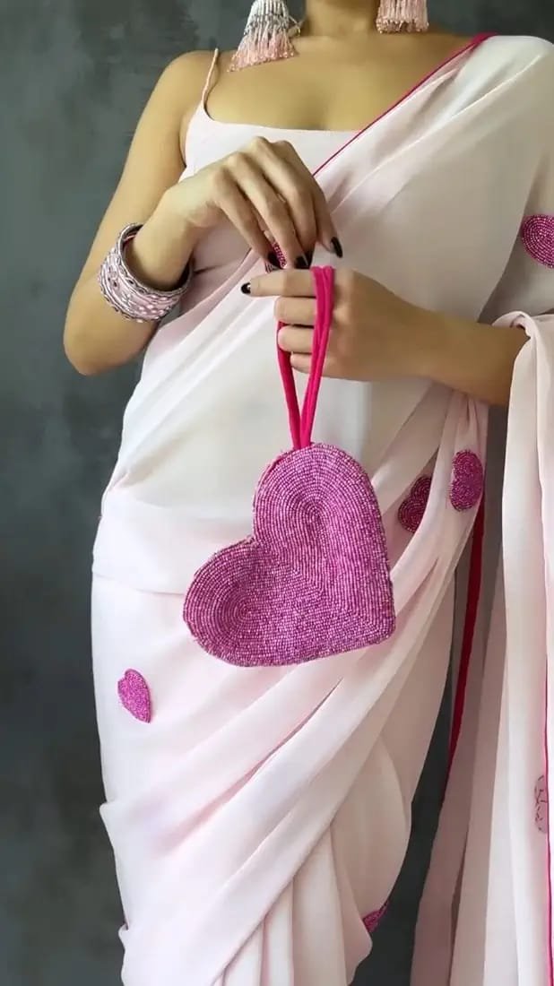 Pink Elegance Embroidered Georgette Saree