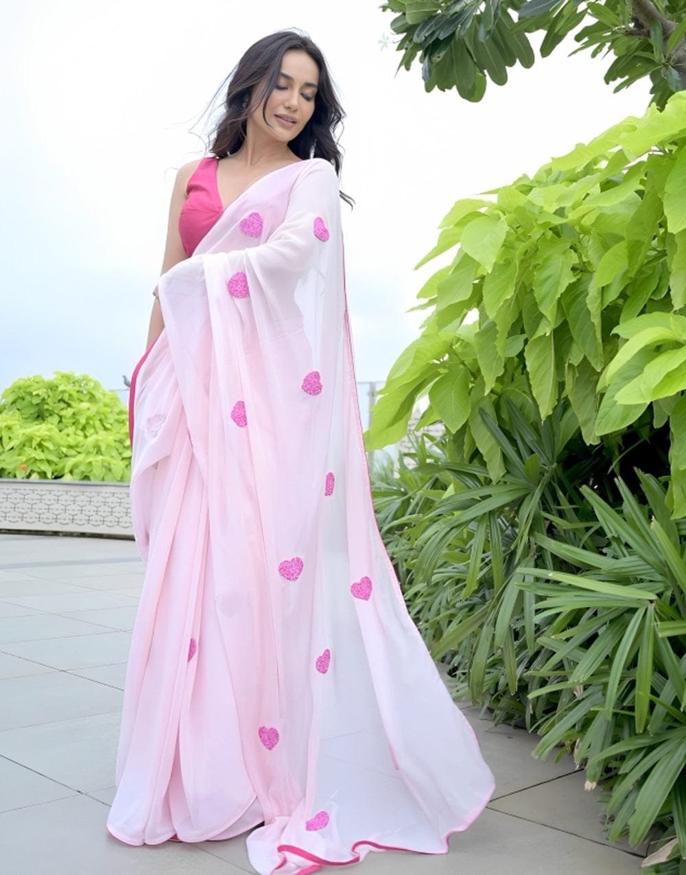 Pink Elegance Embroidered Georgette Saree