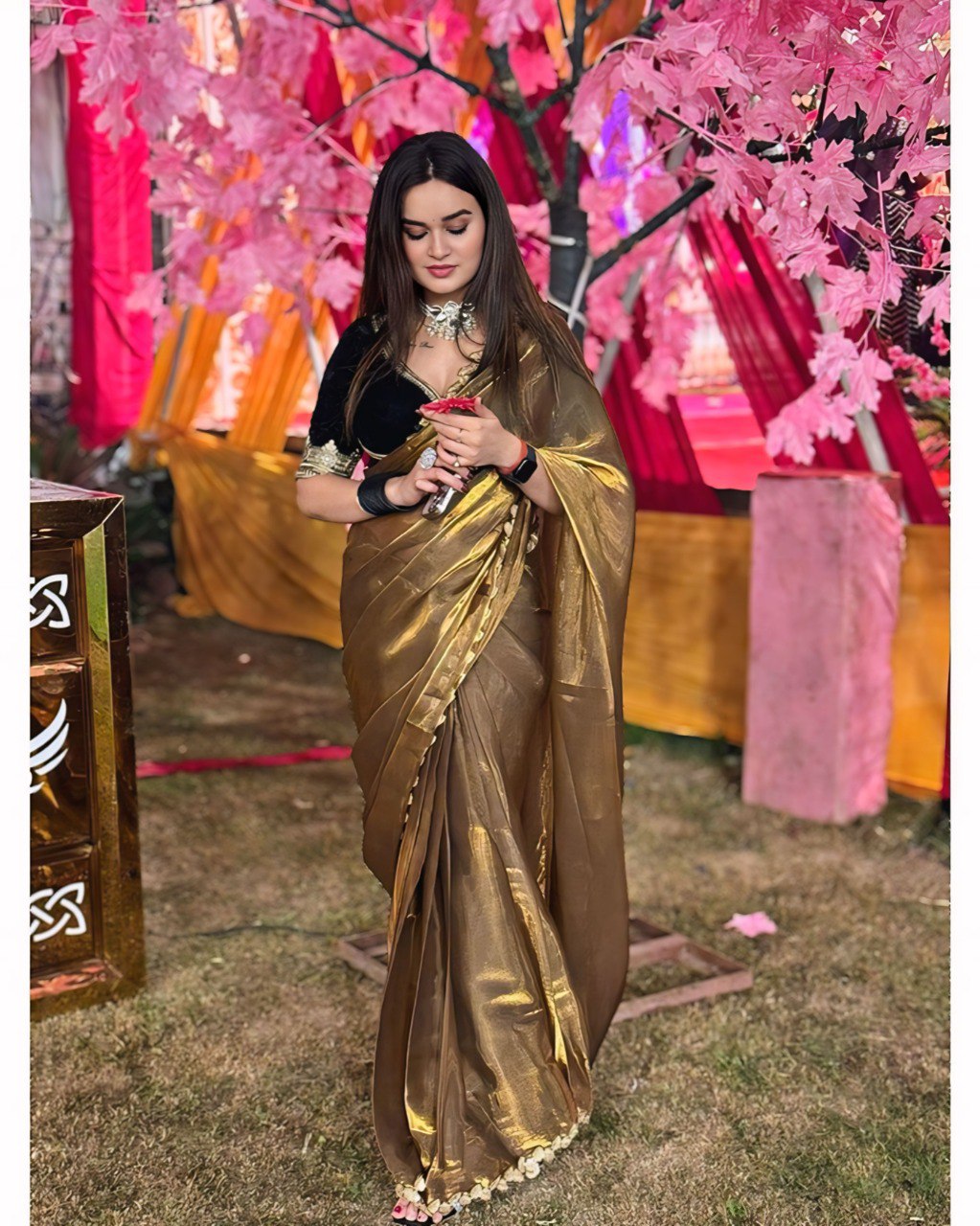 Graceful Green Fancy Silk Saree with Contrasting Black Blouse