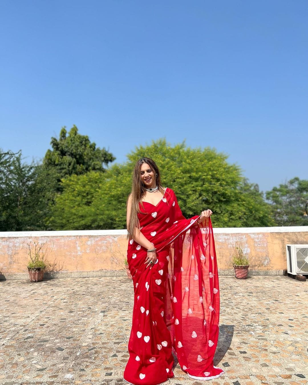 Scarlet Glow Georgette Embroidered Saree