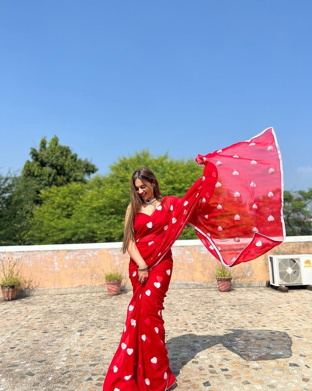 Scarlet Glow Georgette Embroidered Saree