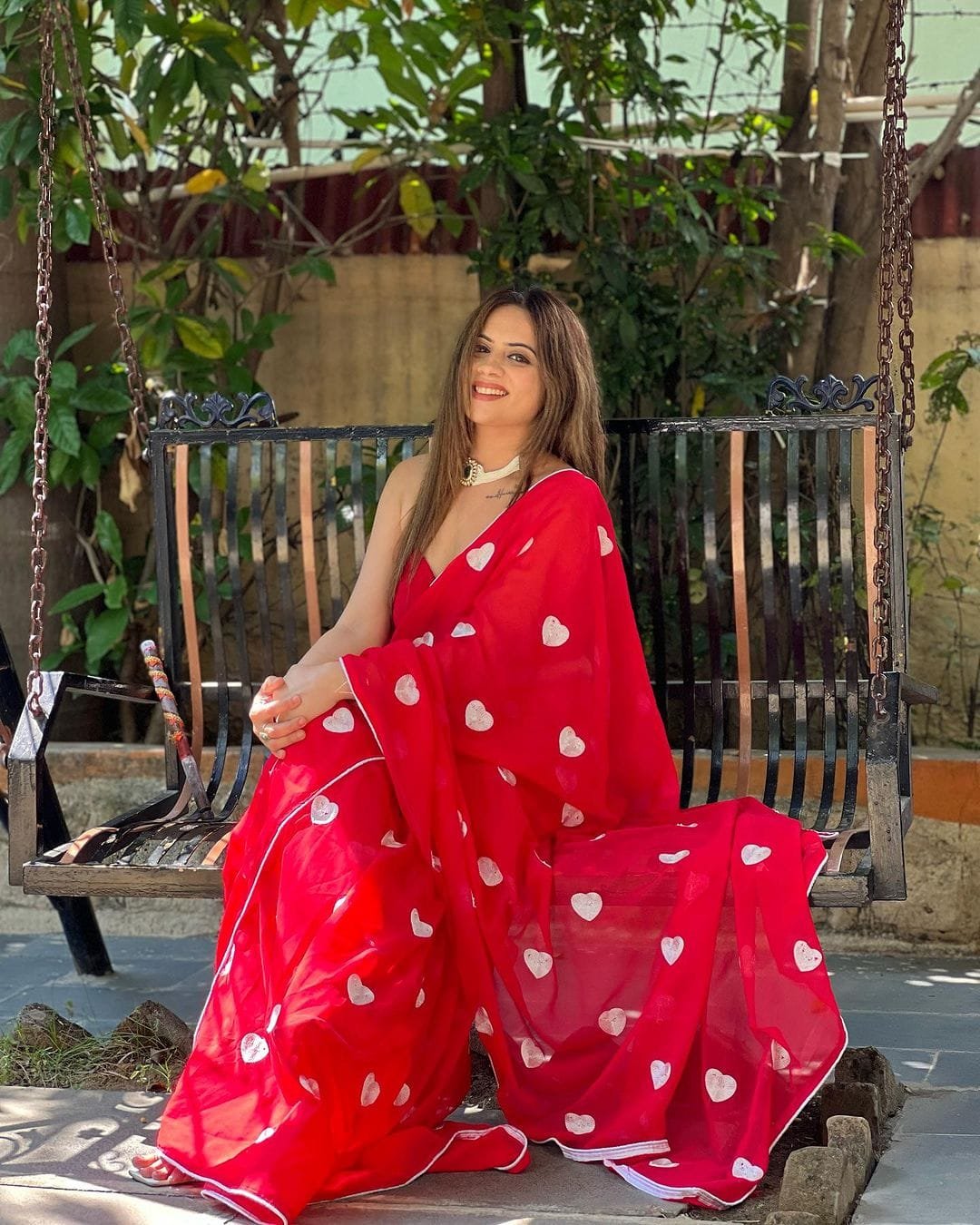 Scarlet Glow Georgette Embroidered Saree