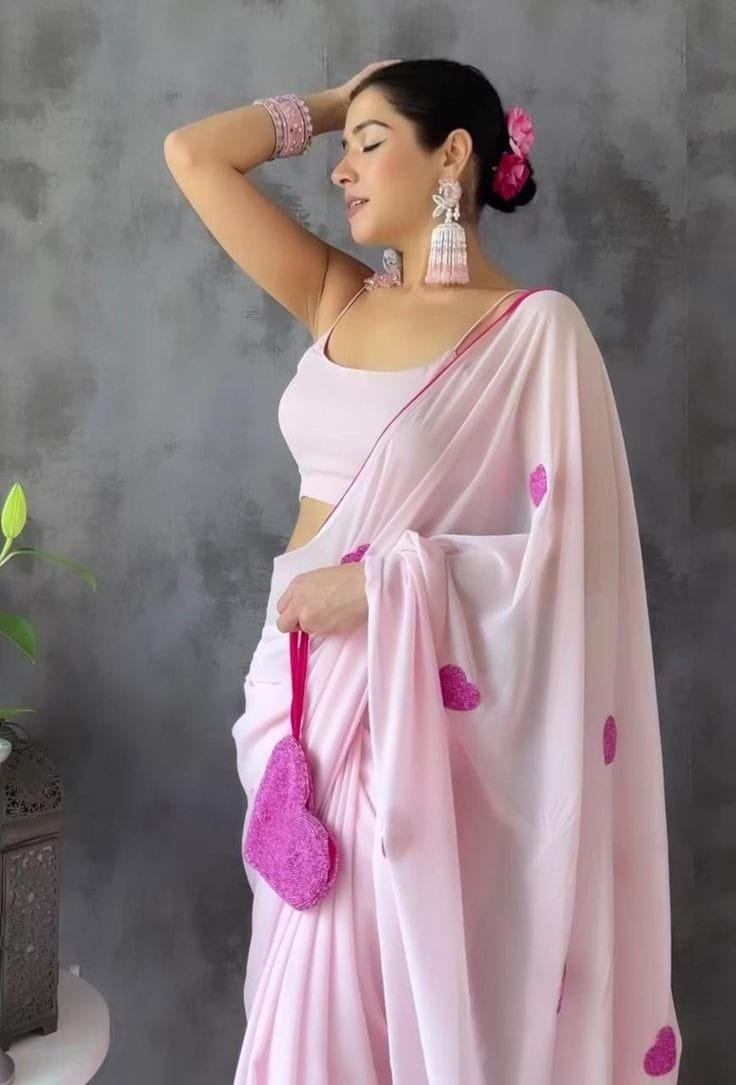 Pink Elegance Embroidered Georgette Saree