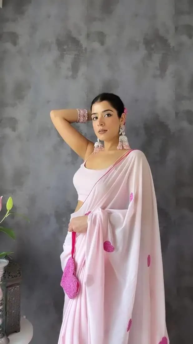 Pink Elegance Embroidered Georgette Saree