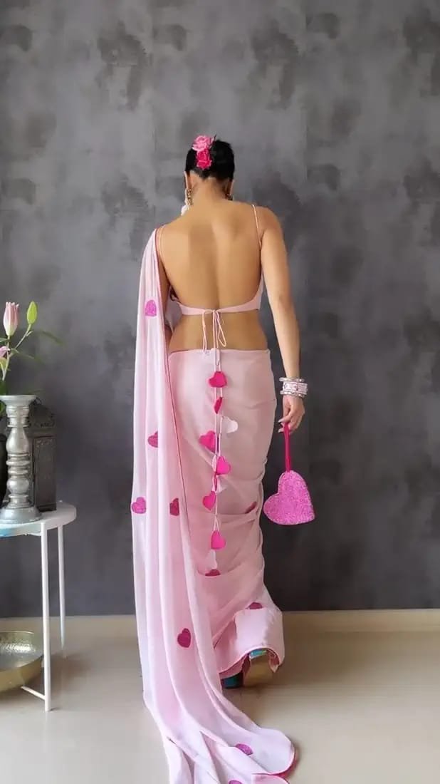 Pink Elegance Embroidered Georgette Saree